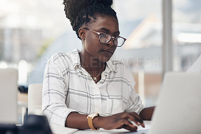 Buy stock photo Laptop, typing and business woman for online research, editing or copywriting at her office desk with email. Planning, working and african person, editor or employee on computer for blog or article