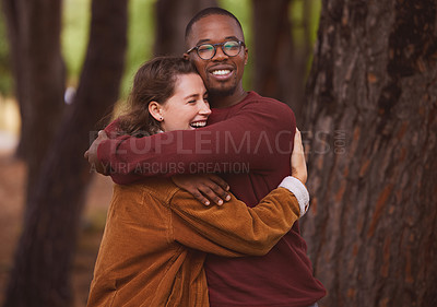 Buy stock photo Love, hug and couple together in outdoor for camping in wilderness on anniversary date in Norway, countryside. Interracial people, travel and happiness on vacation in forest for peace and adventure.
