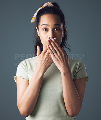 Buy stock photo Gossip, surprise and portrait of woman in studio with secret, drama and shocked on grey background. Female person, emoji gesture and hands on mouth for notification, news and confidential information