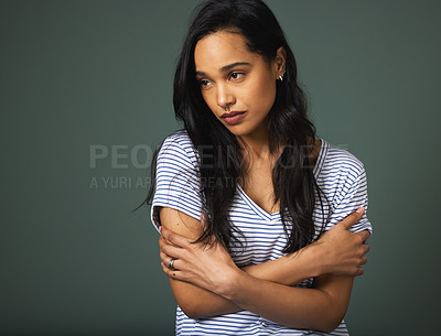 Buy stock photo Stress, sad woman or thinking of anxiety in studio for burnout, mistake or mental health crisis. Scared, fear or girl worried by bad news, doubt and loss in depression isolated on grey background
