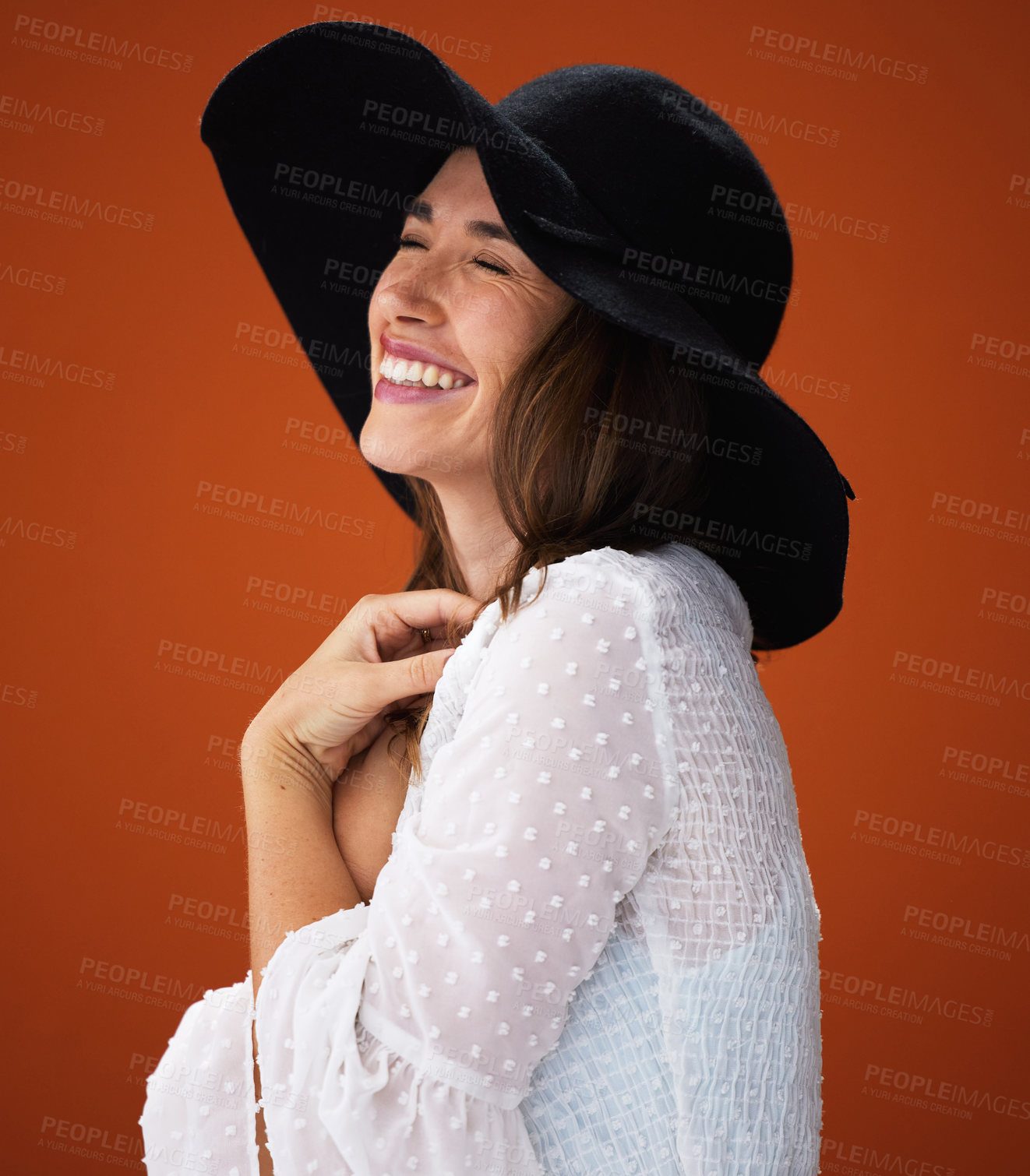 Buy stock photo Woman, smile and hat with studio for fashion with beauty, trendy and summer outfit for vacation style inspiration. Beach trip, trends and brown background with glamour for self esteem with urban