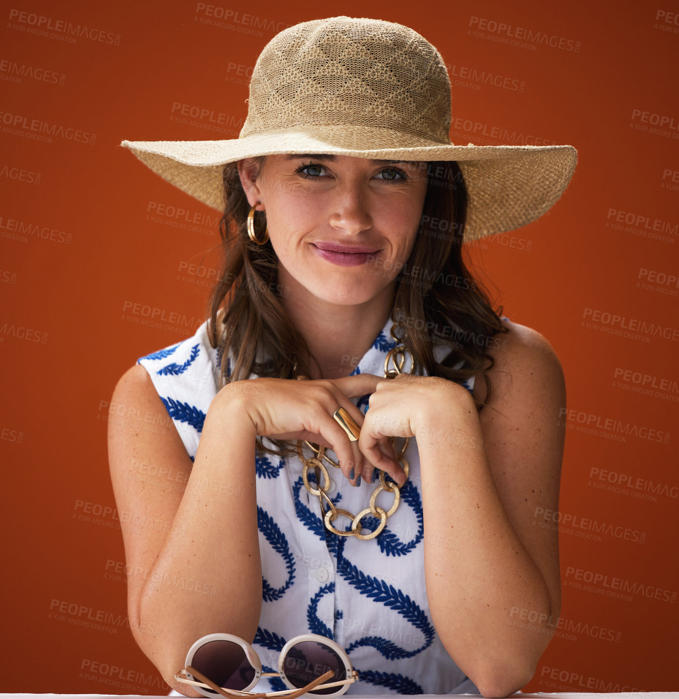 Buy stock photo Woman, hat and studio with portrait for fashion with confidence, trendy and summer outfit for vacation style inspiration. Beauty, brown background and trends with glamour for pride with self esteem