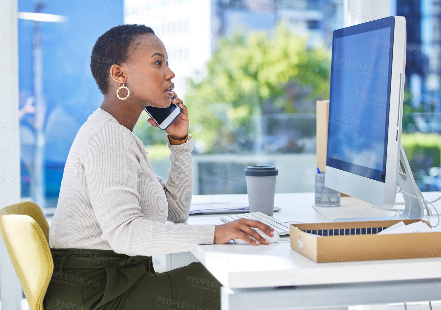 Buy stock photo Business, phone call and black woman at desk, computer and communication with conversation, planning and consultant. African person, office and employee with cellphone, contact and speaking with app