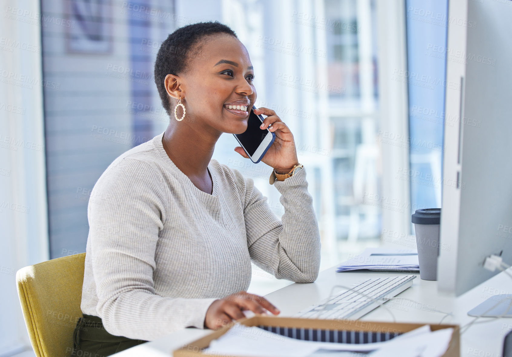 Buy stock photo Employee, phone call and black woman at desk, computer and connection with contact, conversation or consultant. African person, administrator or assistant with cellphone, speaking with pc or internet