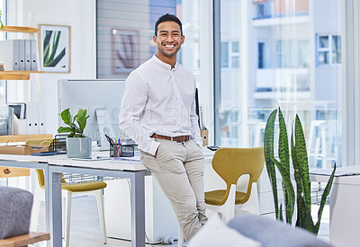 Buy stock photo Portrait, smile and business man in office at desk for career and job at company in Mexico. Face, happy professional and confident entrepreneur, employee and young consultant worker in workplace