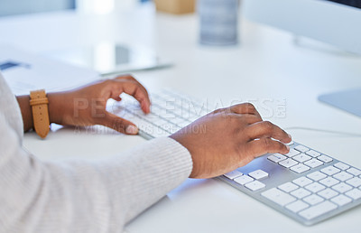 Buy stock photo Cropped shot of an unrecognizable woman typing on her keyboard