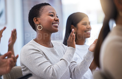Buy stock photo Shot of a group of people clapping and smiling during a meeting at work