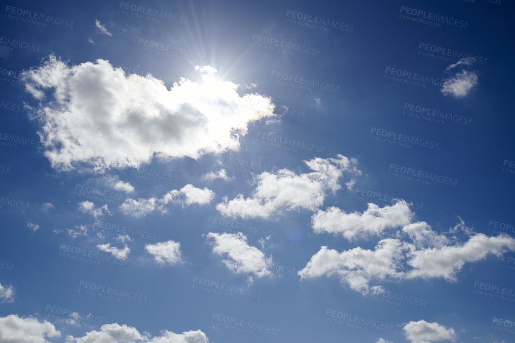 Buy stock photo Copy space with altocumulus clouds in a clear blue sky from below. Beautiful panoramic of fluffy white cloudscape background for cool climate and season of sunny weather in the atmosphere outdoors 
