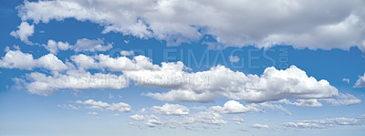 Buy stock photo Landscape and panoramic view of clouds in a blue sky during summer. Banner of a beautiful cloudy climate and atmosphere with cumulus clouds on a sunny day.  Pretty weather and natural environment