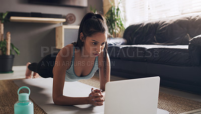 Buy stock photo Pilates, woman and plank with laptop on a floor for exercise, fitness and training in living room. Online, push up and female person in a lounge for cardio, workout and endurance routine in her home