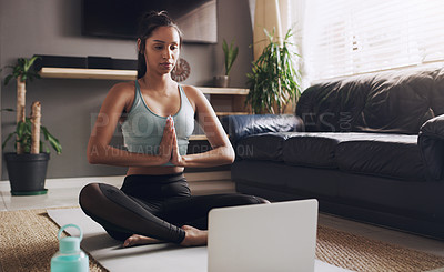 Buy stock photo Praying hands, laptop and meditation for Indian woman on a floor for exercise, breathing or training in living room. Computer, yoga and lady person relax while meditating for zen, peace or balance