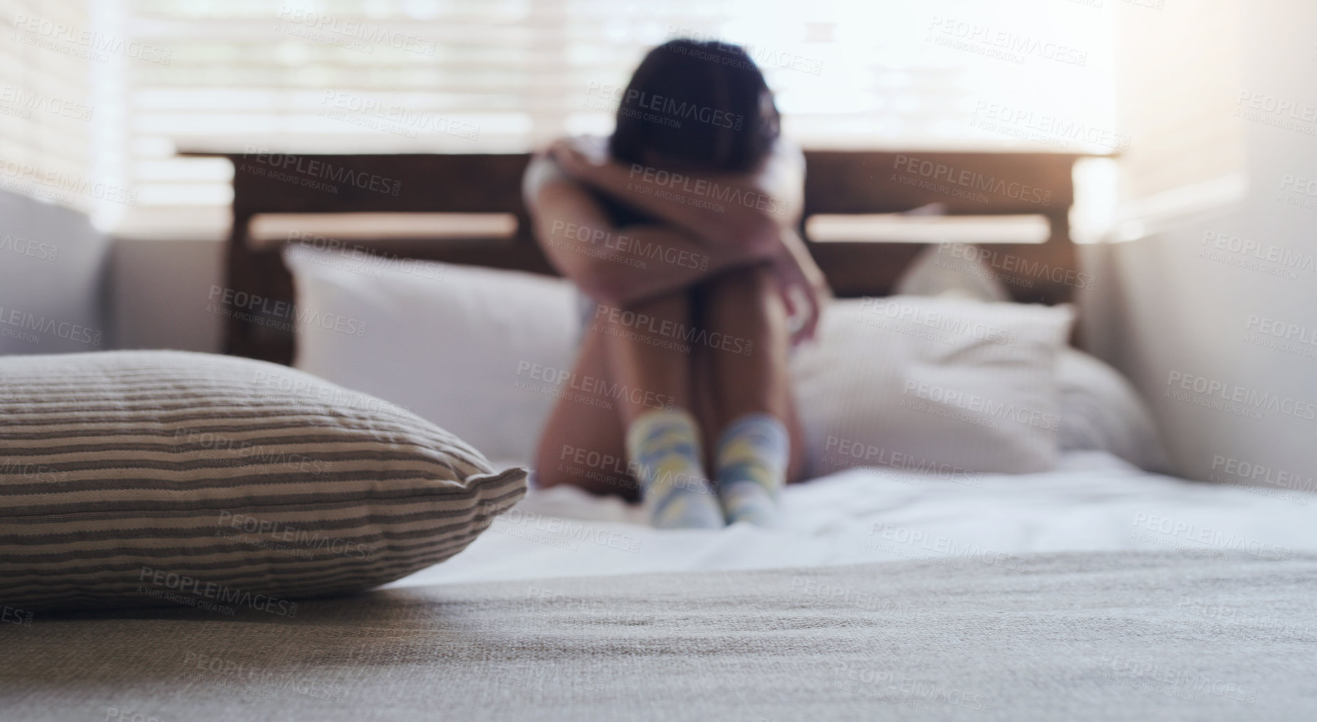 Buy stock photo Crying, depression and woman in a bed with stress, insomnia or mental health problem in her home. Anxiety, fear and sad female person with ptsd, abuse or phobia, lonely and paranoid in a bedroom