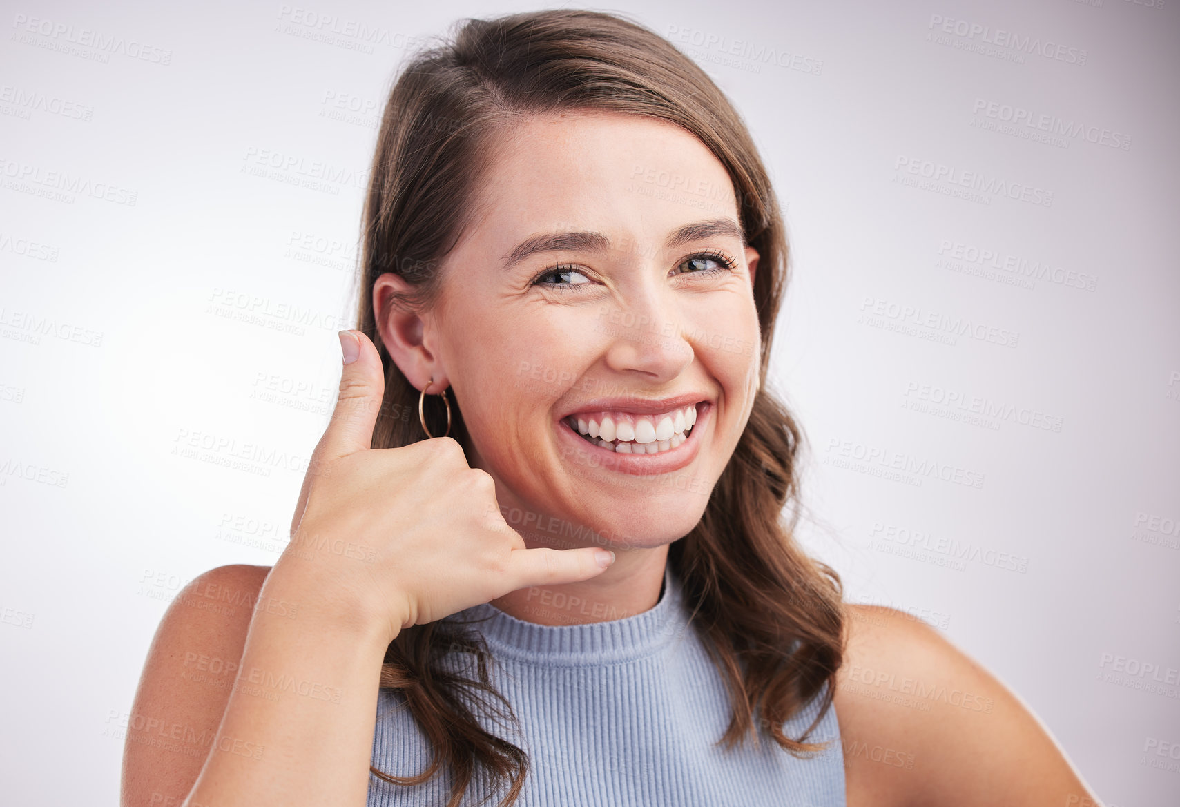 Buy stock photo Studio, portrait and woman with call me sign for flirting, networking and contact with mockup. Female person, hand emoji or gesture to communicate, social and conversation on white background