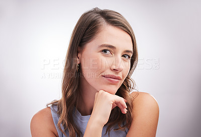 Buy stock photo Beauty, natural and portrait with relaxed woman on studio gray background for inspiration or wonder. Casual, face and wellness with confident person looking calm for contemplation, idea or thinking