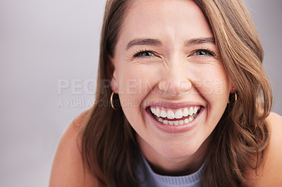 Buy stock photo Laugh, beauty and portrait of woman in studio with positive, good and confident attitude. Happy, pride and headshot of person from Canada with smile for teeth health by gray background with mockup.