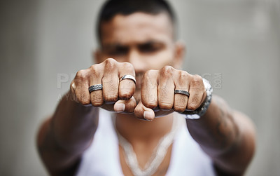 Buy stock photo Hands, ring and man with fashion, jewellery and gangster with style, accessories and fist. Person, hand gesture and guy with trendy outfit, wearable and elegant with confidence, silver and luxury
