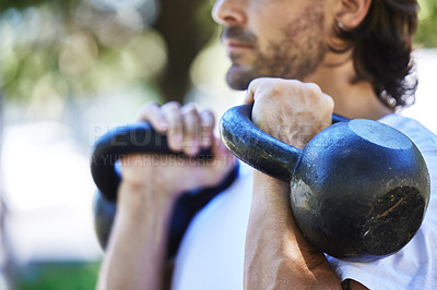 Buy stock photo Outdoor, fitness and man with kettlebell in park for exercise, training and workout in nature. Sports, male person and equipment for muscle strength, physical and wellness with weight lifting