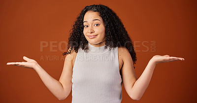 Buy stock photo Portrait, woman and studio with comparison, choice and hand gesture on background with shrugging shoulders. Female person, options and doubt on backdrop in mockup space in indecision for alternatives