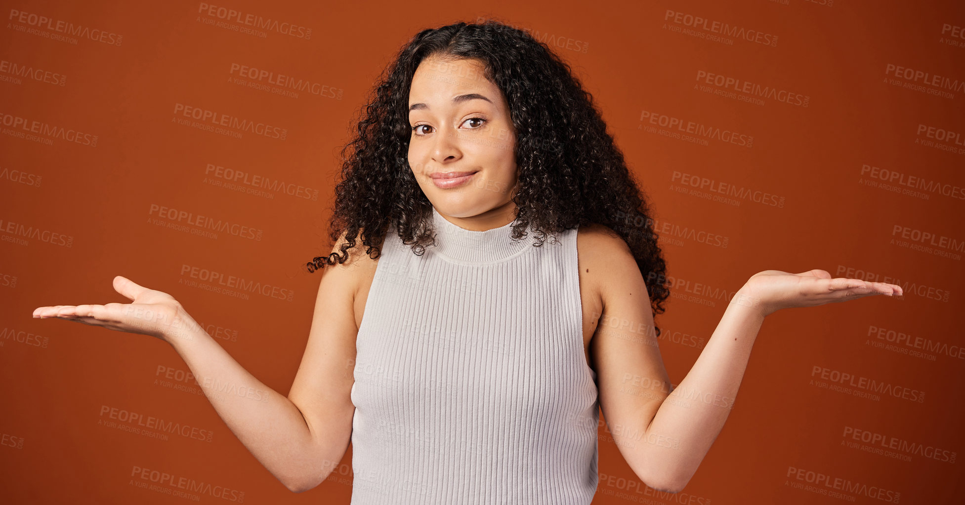 Buy stock photo Portrait, woman and studio with comparison, choice and hand gesture on background with shrugging shoulders. Female person, options and doubt on backdrop in mockup space in indecision for alternatives