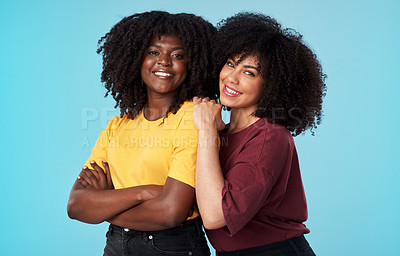 Buy stock photo Portrait, African and friends with women in studio on a blue background together for freedom or empowerment. Support, love and an attractive young black female standing arms crossed with a friend