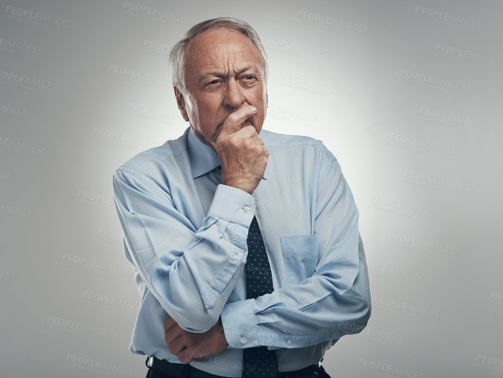 Buy stock photo Serious, CEO and businessman with choice in studio, planning or reflection for financial development. White background, entrepreneur and mature person with investment, mockup space and decision