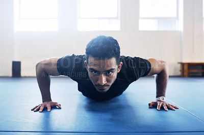 Buy stock photo Sports, push up and fitness with man in gym for strong, workout and muscle. Exercise, power and health with male athlete and training on floor for wellness, abdominal challenge and balance