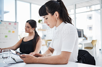 Buy stock photo Woman, office and tablet with focus, business people and analytics for planning, data or company success. Corporate women team, mobile touchscreen tech or together for collaboration, strategy or goal