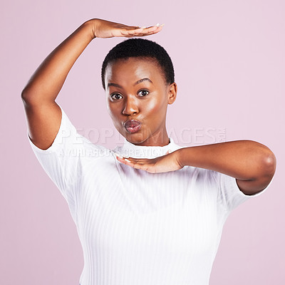 Buy stock photo Black woman, portrait and frame hand sign with box, vogue and fun gesture in a studio. Kiss, funny and happy with modern and casual fashion with pink background and silly with minimalist fashion