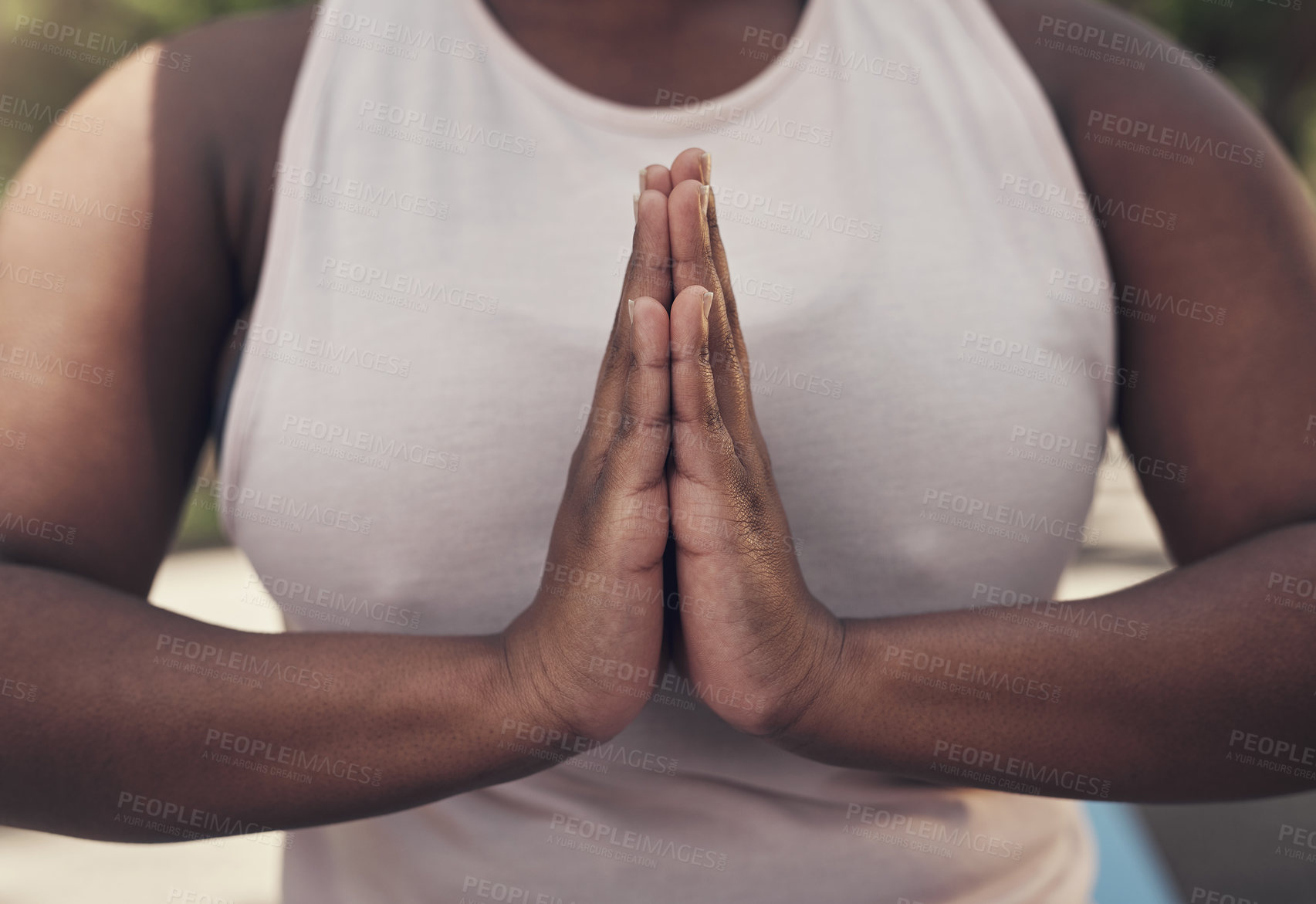 Buy stock photo Shot of a woman meditating as part of her workout routine