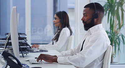 Buy stock photo Black man, call center and computer with typing in office for email communication, tech support or telemarketing. Crm, consulting and african agent with woman, pc and customer service in workplace