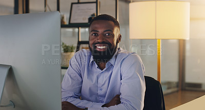 Buy stock photo Black man, business and portrait in night, office and smile with computer, pride and arms crossed. African businessman, auditor or entrepreneur in overtime with pc, finance or happy in dark workplace