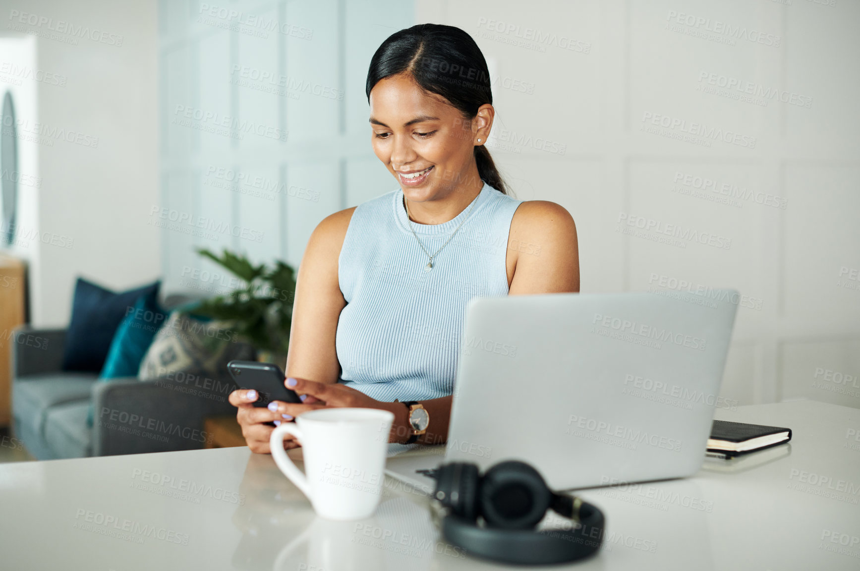 Buy stock photo Laptop, coffee and woman with phone in kitchen networking on website, internet or mobile app. Technology, smile and female person typing email on cellphone by counter with computer in apartment.