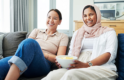 Buy stock photo Portrait, women and friends, hijab and popcorn for movies, break and weekend, smile and relax on couch. Home, happiness and female people, apartment and living room, sofa and entertainment in house