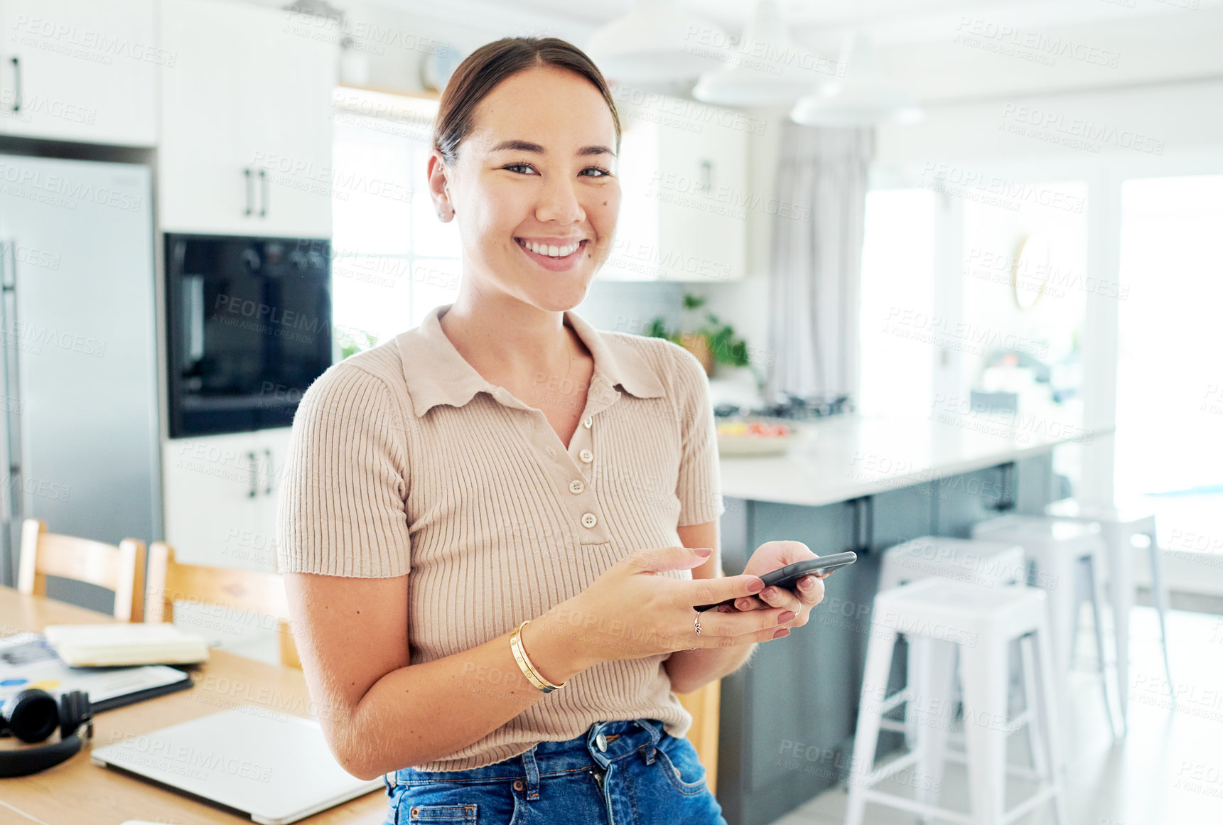 Buy stock photo Kitchen, home and portrait of woman with smartphone for remote work, communication and online job. Happy, house and asian person with technology for network, digital consultation or freelance website