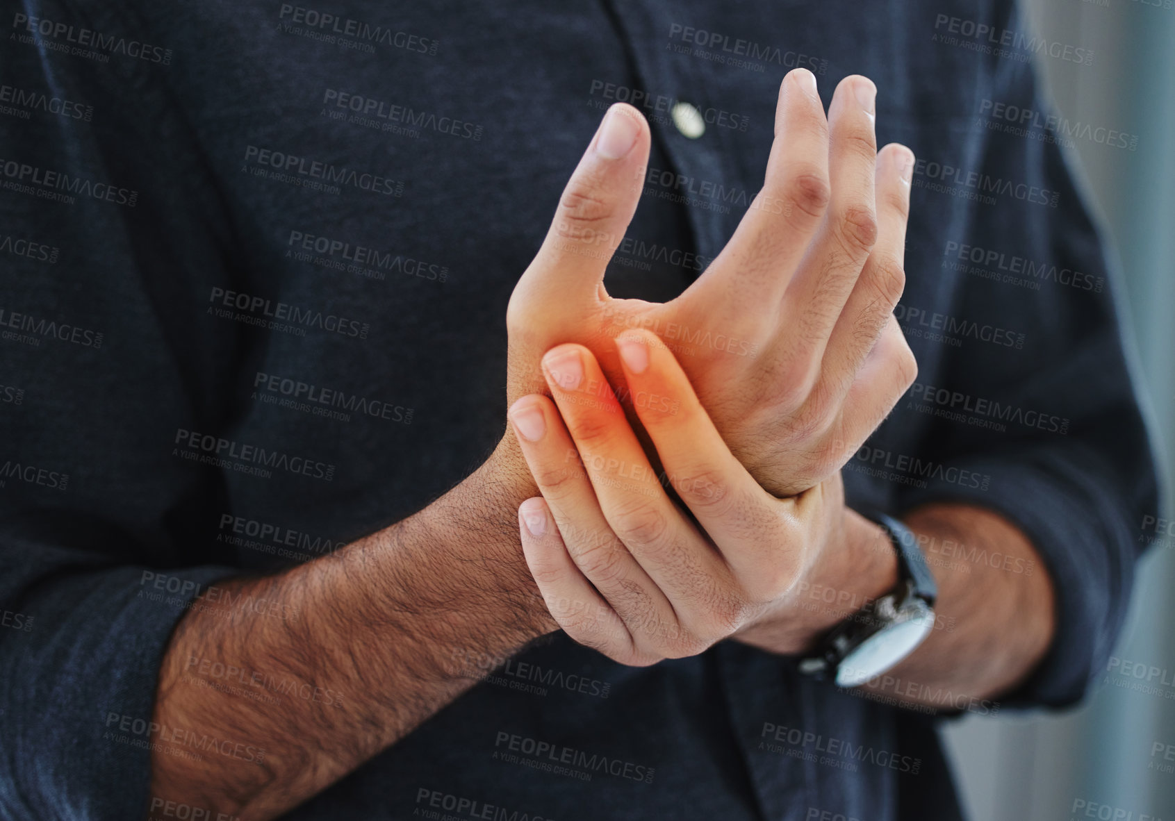 Buy stock photo Man, pain and hand with red glow in office for injury, arthritis and muscle fatigue with joint inflammation. Male person, carpal tunnel and glowing hands at work with fibromyalgia and trauma to bone