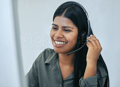 Buy stock photo Help desk, phone call and Indian woman in office for customer service, telemarketing and headset at call center. Advisor, agent or virtual assistant in client care, tech support or crm consulting.