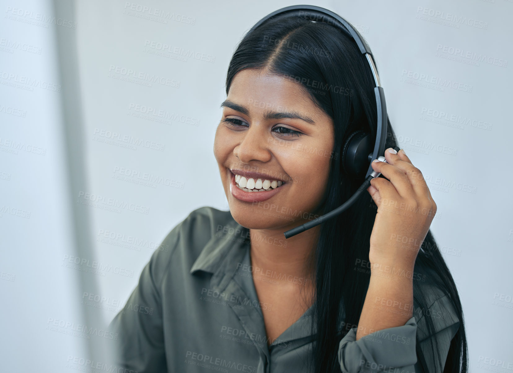 Buy stock photo Help desk, phone call and Indian woman in office for customer service, telemarketing and headset at call center. Advisor, agent or virtual assistant in client care, tech support or crm consulting.
