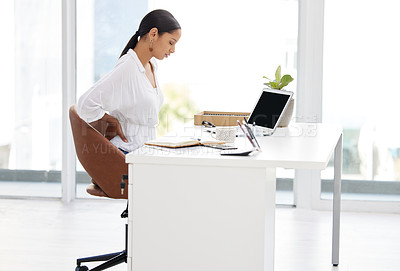 Buy stock photo Back pain, laptop and business woman in office with stress, injury or accident for medical emergency. Burnout, computer and professional female designer with spine muscle sprain by desk in workplace.