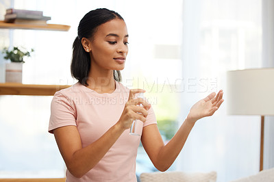 Buy stock photo Hand, sanitizer and woman with spray bottle at home for hygiene, protect or antibacterial disinfectant. Cleaning, hands and woman with product for safety from bacteria, germs or illness in her house