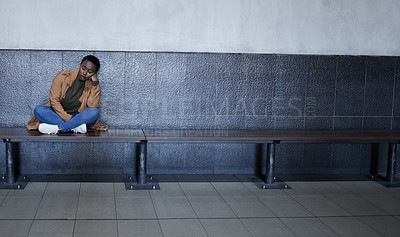 Buy stock photo Woman, sad and tired with depression in subway for bad memory, grief and lonely on travel. African girl, person and mental health at train station for anxiety, lost and stress for future in New York