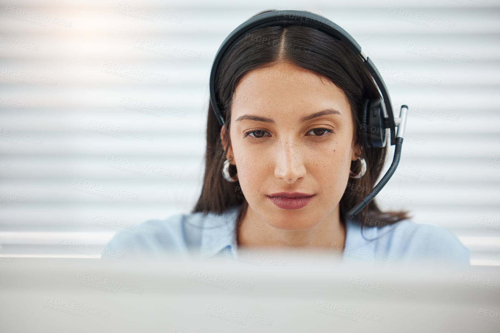 Buy stock photo Computer, serious or face of woman consultant in call center talking or networking online in telecom office. Contact us, reading or virtual assistant in communication for research at customer service