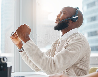 Buy stock photo Celebration, success or black man in call center winning a telemarketing or telecom bonus in office. African consultant, agent or excited virtual assistant with victory, goals or sales achievement