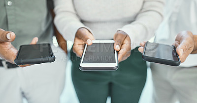 Buy stock photo Cropped shot of three businesspeople using digital tablet in an office