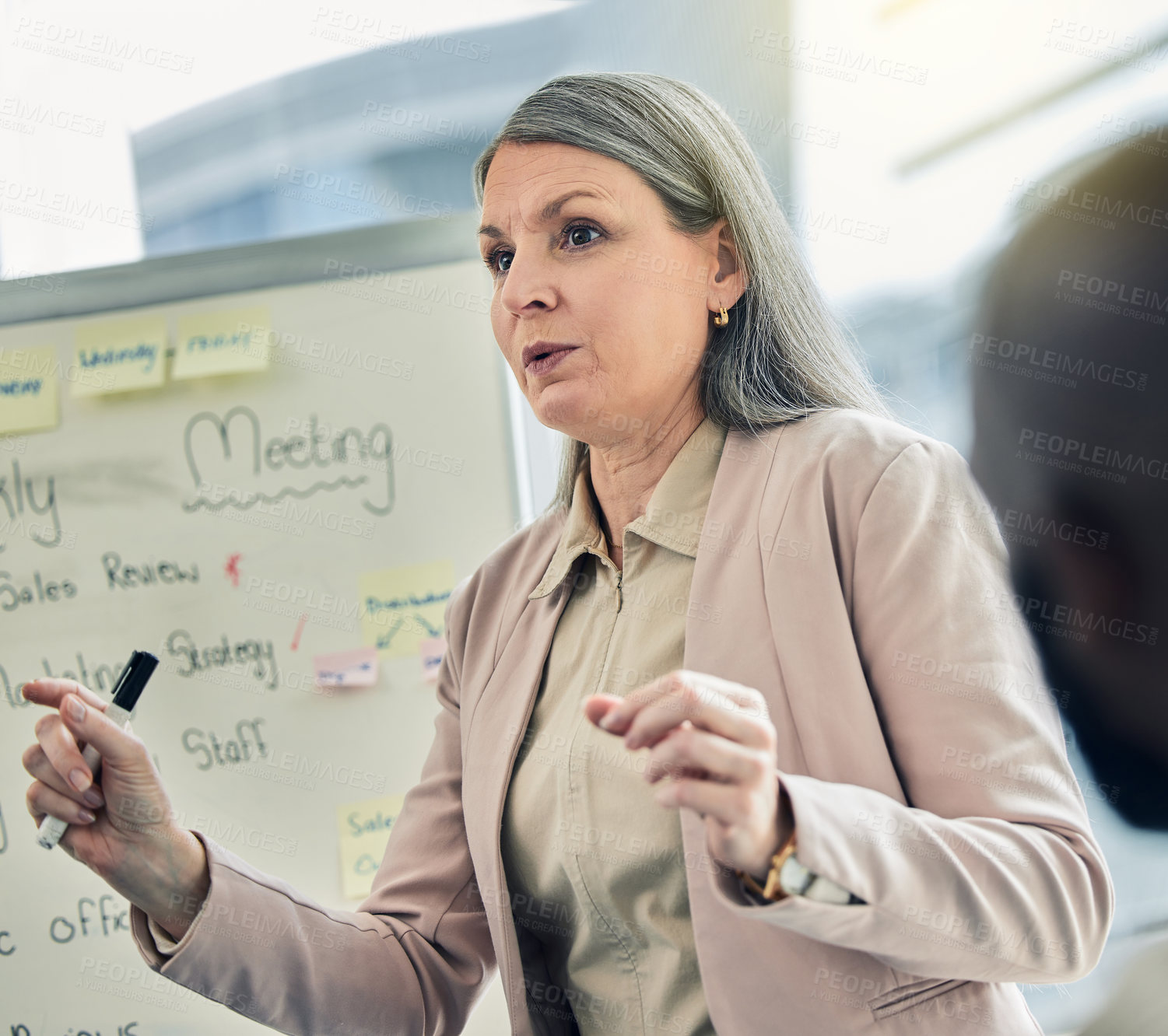 Buy stock photo Business woman, coaching and presentation on whiteboard in planning, strategy or team discussion at office. Female person, CEO or coach training staff in meeting for project plan or idea at workplace