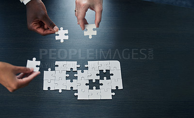 Buy stock photo Business people, hands and puzzle for problem solving, team building or collaboration on mockup. Hand of group in jigsaw solution, planning or teamwork for development above on mock up space