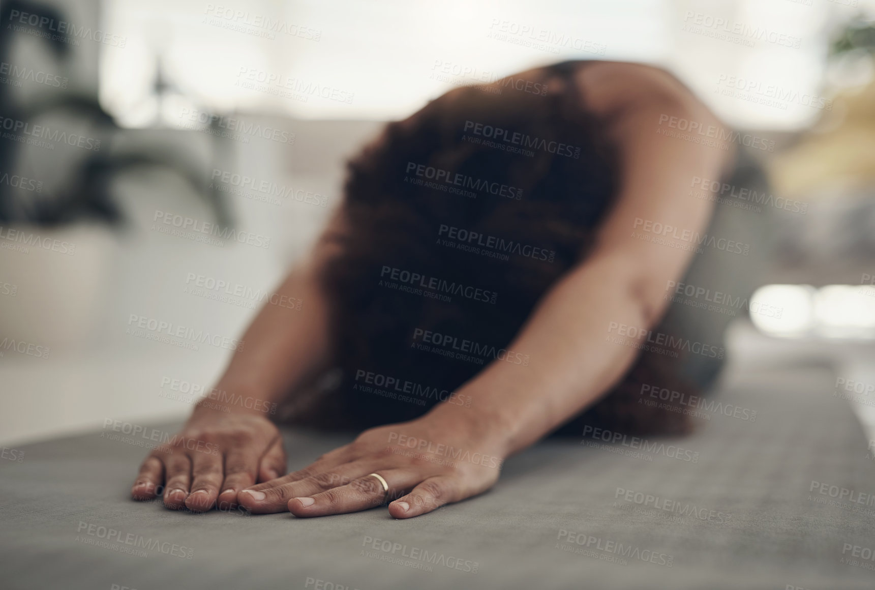 Buy stock photo Stretching, hands and woman with yoga in home, fitness routine and spiritual practice for wellness. Peace, pilates and person with child pose for holistic exercise, muscle relaxation and mindfulness 