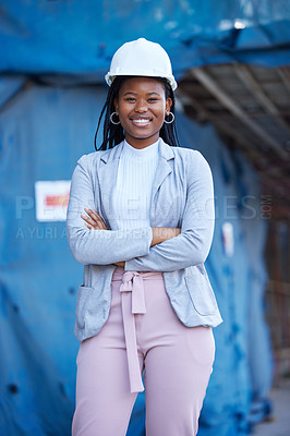 Buy stock photo Shot of a young businesswoman at a construction site