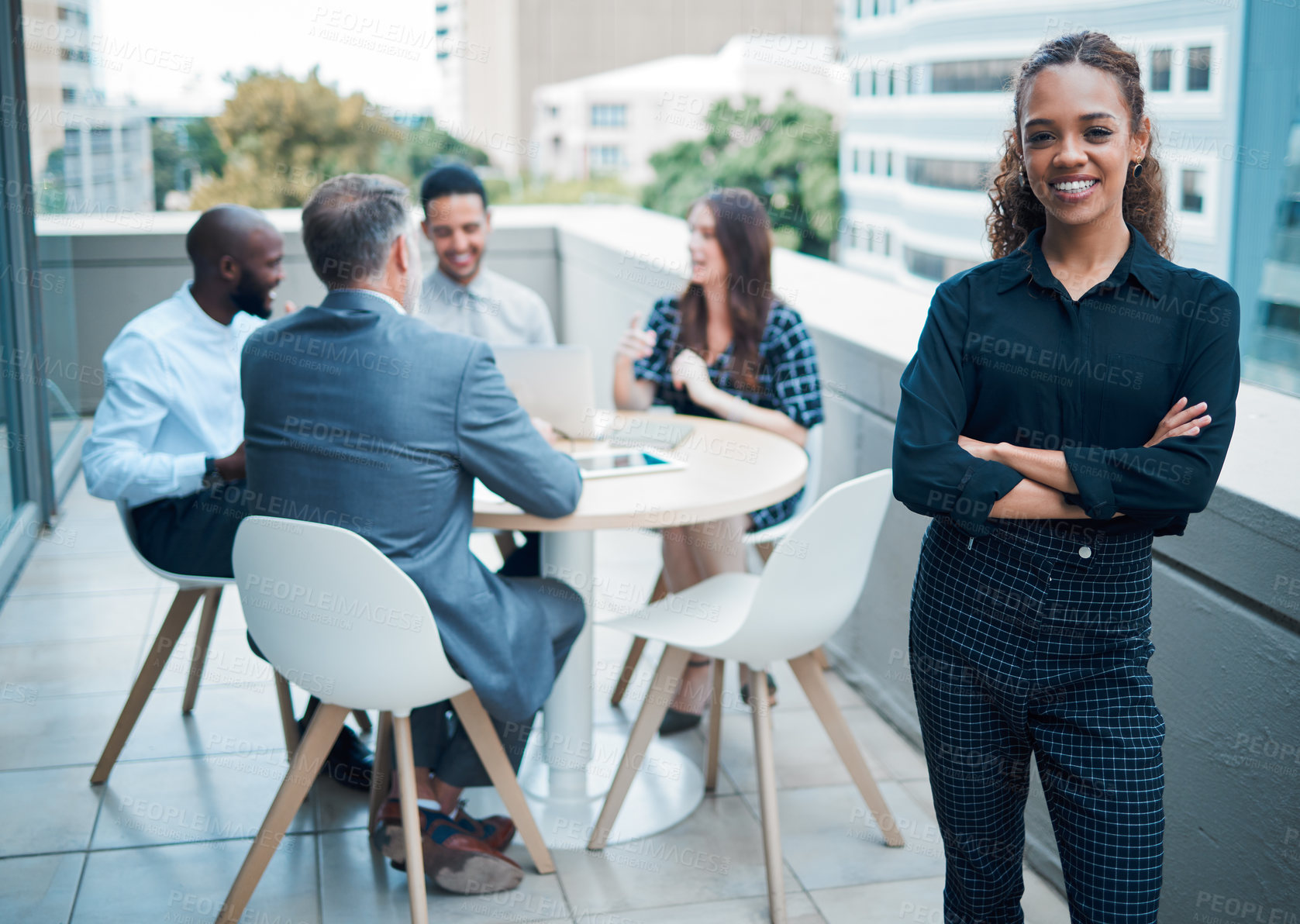 Buy stock photo Portrait, female person and happy on balcony in arms crossed or pride as lawyer in company with colleagues or coworkers. Woman, attorney and smile in outdoor for meeting, networking or brainstorming