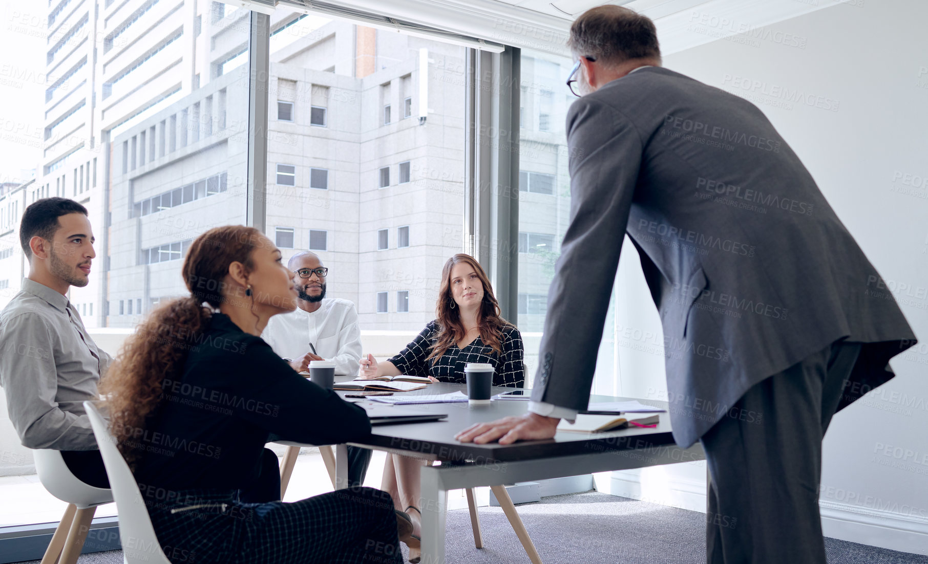 Buy stock photo Group, meeting and listening to boss in boardroom, planning and information for training of staff in startup. City, professional and events company with teamwork for project in New York and people