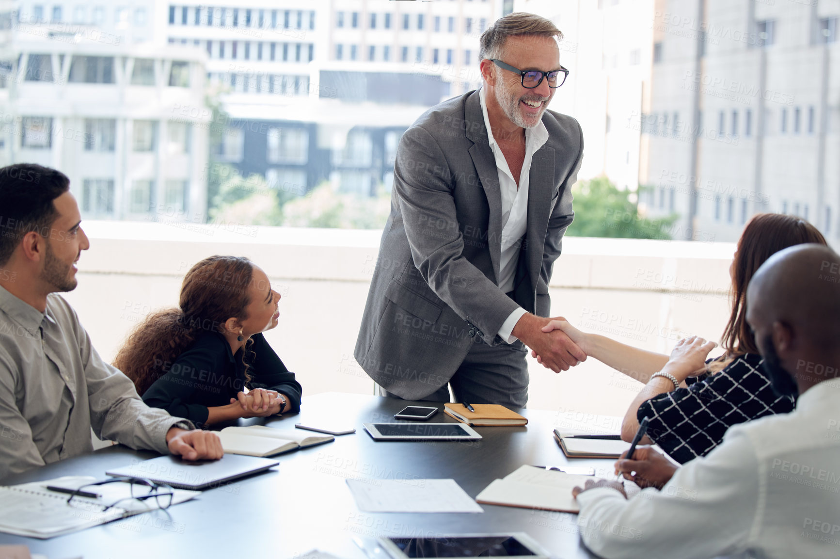 Buy stock photo Business people, handshake and teamwork in boardroom, deal and thank you for onboarding in office. Employees, meeting and congratulations for hire or promotion, introduction and agreement on offer